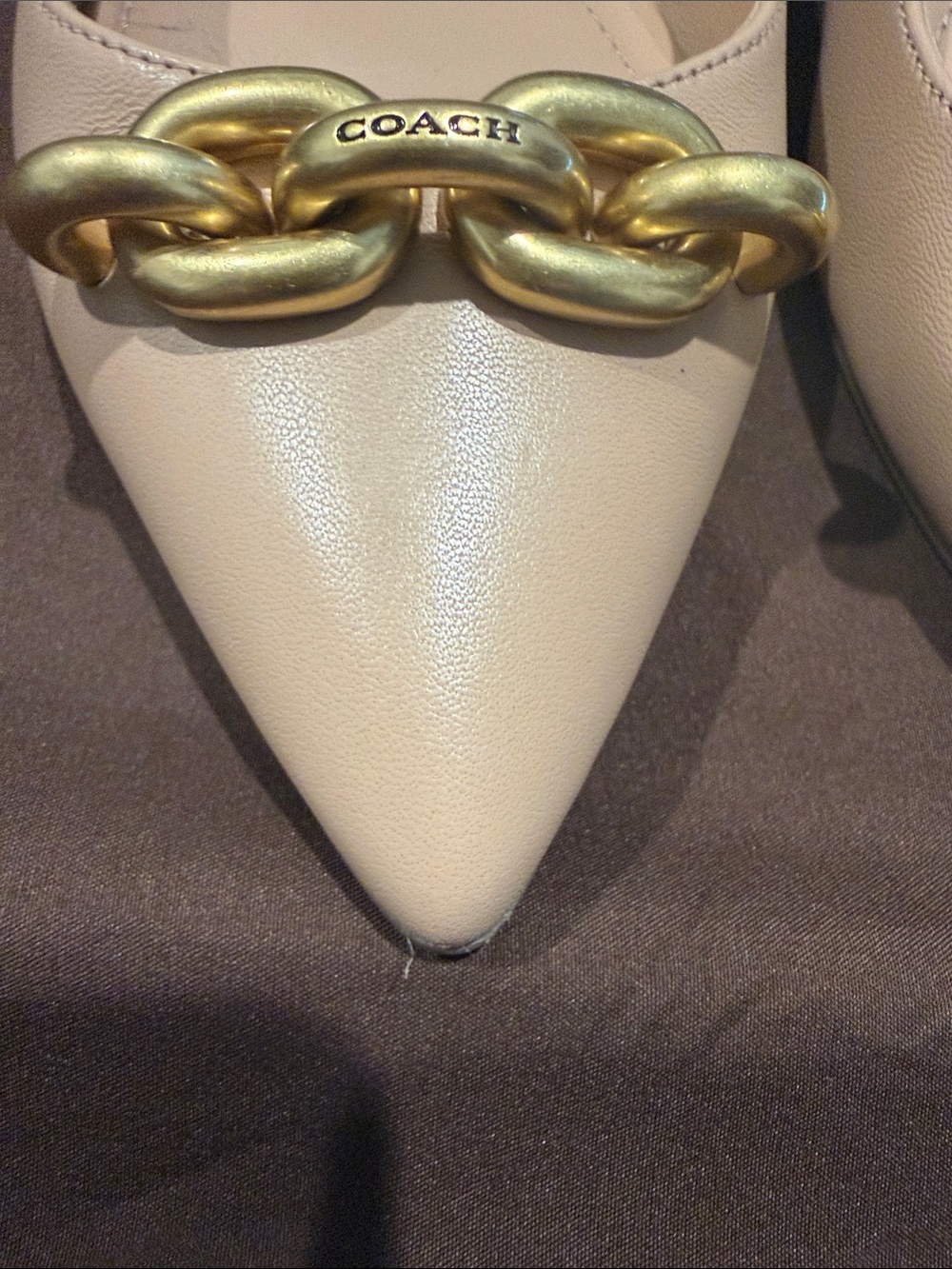 Coach Beige Pointed Toe Flats with Gold Chain Accent